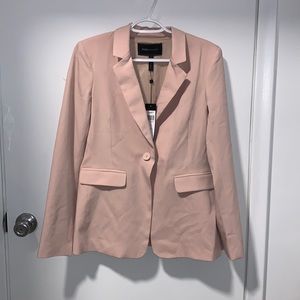 I’m selling this adorable jacket because I’m trying to make space in my closet.